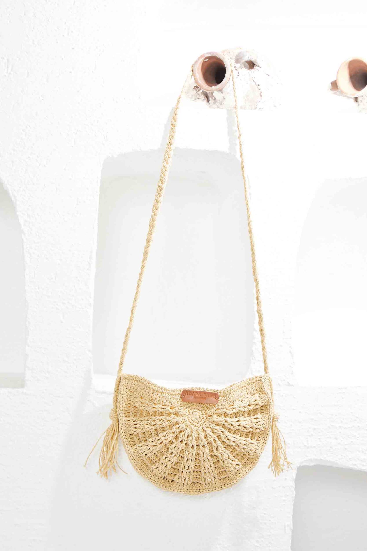 ADAPA RAFFIA HALF MOON BAG