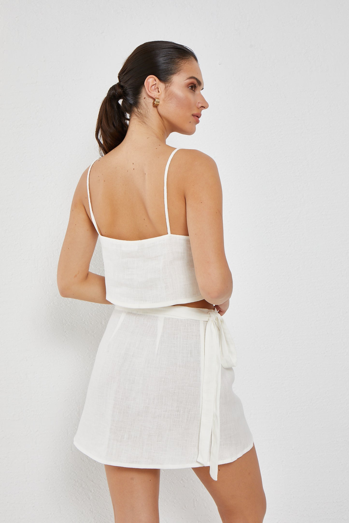 ALLURE MINI WRAP SKIRT